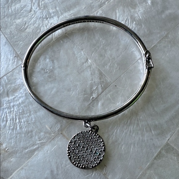 Kate Spade ‘In a Twinkling’ Elegant Silver Hinged Locking Bracelet Sparkle Charm - Picture 1 of 5
